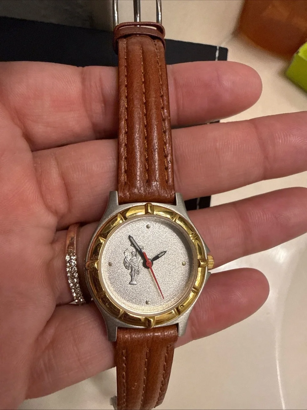 Brown Leather-Strap Watch with Gold-Bezel Accent need battery